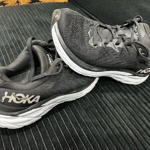 Hoka womans Black and White Running Shoes